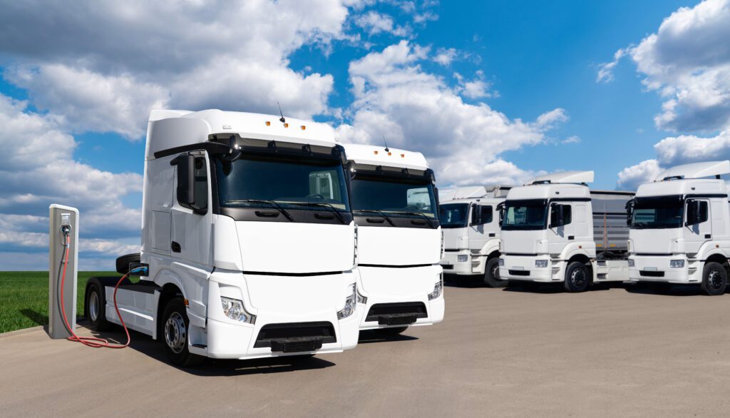 Electric,Trucks,With,Charging,Station.,Concept